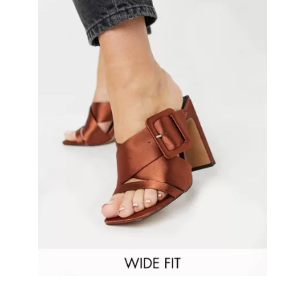 ASOS DESIGN Wide Fit Nanda buckle detail high heeled mules in rust